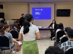 A student asks Maria her question highlighting significance for young people